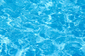 Fototapeta na wymiar Blue swimming pool water background
