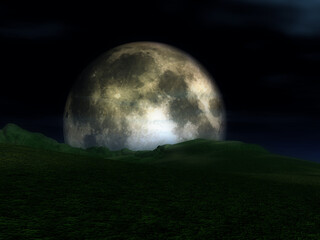 The moon in the nighttime sky in an landscape.