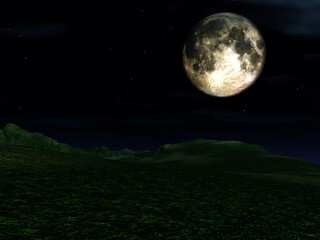 Fototapeta na wymiar The moon in the nighttime sky in an landscape
