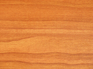 Red wood texture background with horizontally oriented fibers