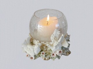 A single round candle holder burning with two doves and flowers.
