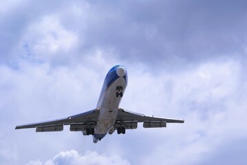 Fototapeta na wymiar Plane in the blue sky