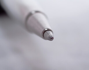 close-up of a roller ball type pen.