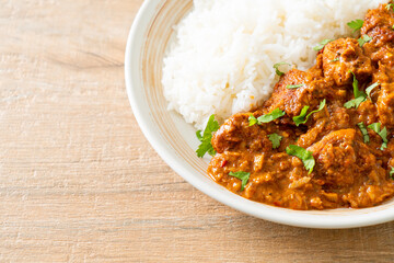 chicken tikka masala with rice on plate