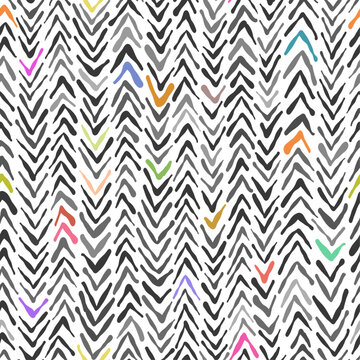 VECTOR SEAMLESS PATTERN background modern scandi winter cosy herringbone knit texture rustic arrows with rainbow color pops. Versatile basic simple unisex line art zigzag chevron pattern	