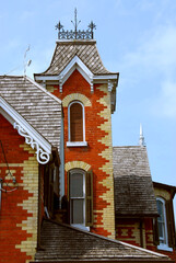 Fragment of a beautiful red brick victorian house