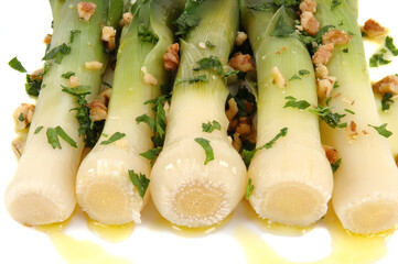 Poached leek with walnuts, parsley, extra virgin olive  and walnut oils, vinegar, and garlic