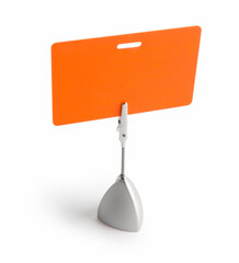 Orange card isolated against white background with the stand
