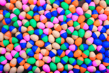 Fototapeta na wymiar Colorful plastic eggs arranged beautifully