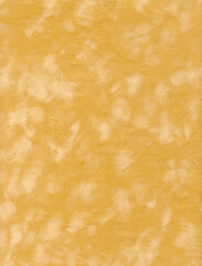 Close up of beige velvet material.