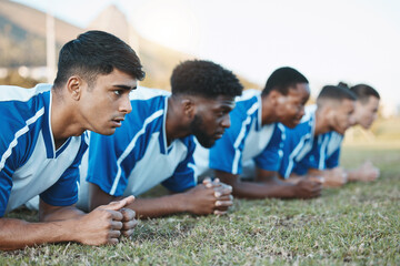 Sports group, soccer and team plank on field for fitness training, workout or exercise outdoor. Football player, club and diversity athlete men with focus for strong competition or sport challenge © Wesley J/peopleimages.com