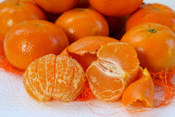 Fresh peeled mandarins ready to eat.