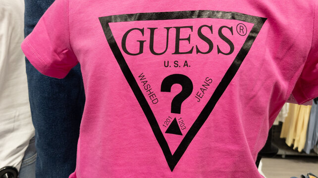 Guess usa brand logo and sign text on shirt clothing American store line