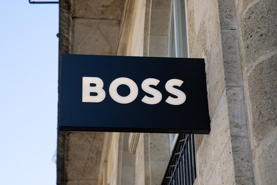 Hugo Boss store sign logo and text on wall facade German clothing fashion brand shop