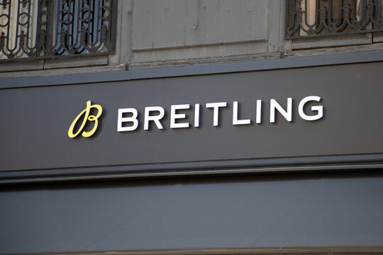 Breitling logo brand and text sign swiss watches wall shop entrance jewelry store facade boutique