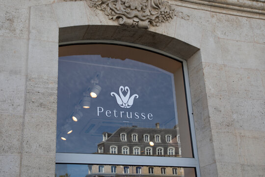 petrusse sign and logo text wall facade shop luxury boutique entrance for fashion clothes brand