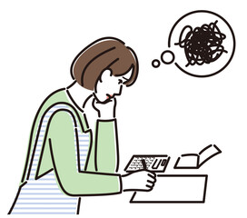 家計簿をつけて思い悩む女性