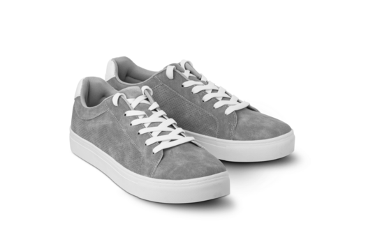 Leather grey color men's sneakers with white lace and rubber soles isolated on white background