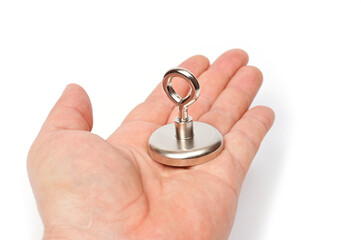 Powerful neodymium search magnet in the shape of a puck in a steel case with directional action.