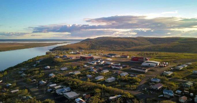 Timelapse Aerial Panning A Remote Settlement Along A Rugged And Barren Coastline - Bering Sea, Alaska
