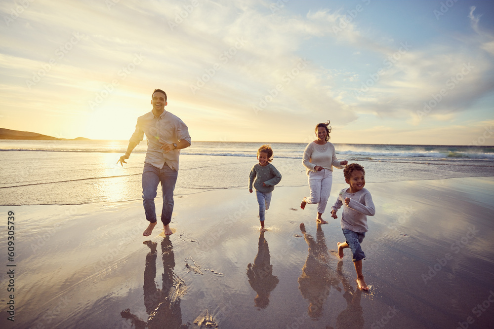 Wall mural Beach, running and parents play with children on holiday, summer vacation and weekend together. Nature, travel and happy mother, father and children in ocean for bonding, adventure and family time