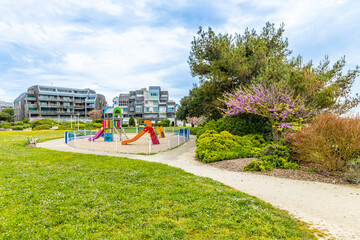 Playground and path of the Allee Stella Maris at the Pointe des Minimes in La Rochelle, France - obrazy, fototapety, plakaty