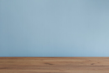 background with modern wooden table and blue  wall