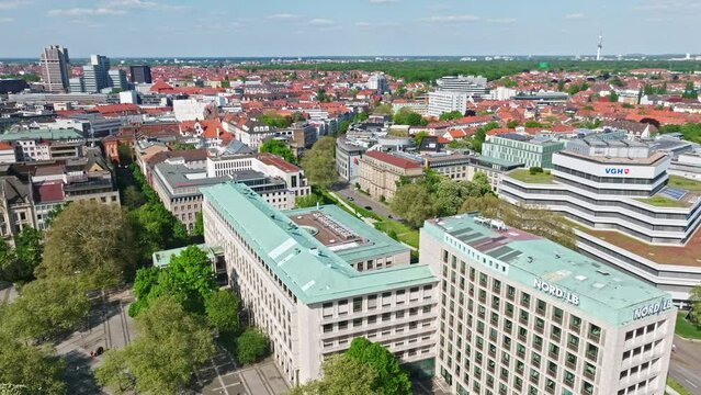 Drone shot of Hanover city centre , Germany . The historic heart of the city, Mitte is full of restaurants, cafes, and department stores. Monuments dot the largely pedestrianized Altstadt area .