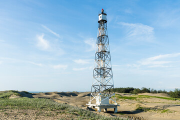 Building view of the Guosheng Lighthouse in Qigu, Tainan, Taiwan. The westernmost point of Taiwan and Taijiang National Park Attractions.