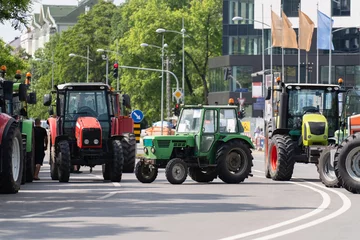 Foto op Canvas Farmers blocked traffic with tractors during a protest  © scharfsinn86