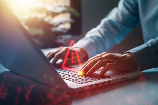 System hacked warning alert on notebook (Laptop). Cyber attack on computer network, Virus, Spyware, Malware or Malicious software. Cyber security and cybercrime. Compromised information internet.