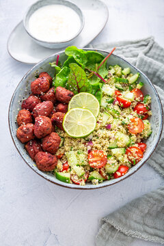 Buddha Bowl With Beetroot Falafel Balls And Lemon Yogurt Dip. Tabbouleh Salad. Levantine Vegetarian Salad