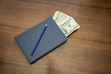 Dollars and shackles with drugs on a beautiful background close-up