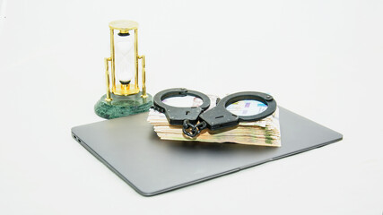 Dollars and shackles with drugs on a beautiful background close-up