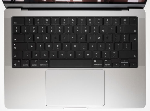 KAUNAS/LITHUANIA-JUNE 05, 2023: New macbook pro M2 14 inch laptop. Space gray color