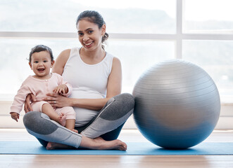 Mom, baby and floor in portrait by exercise ball, laughing and bonding together for fitness, health and wellness. Workout, pregnant mother and newborn with happiness, home and excited face for yoga