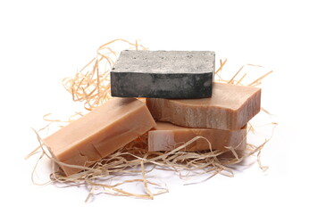 Collection organic homemade soap bar in curls of wood isolated on white 