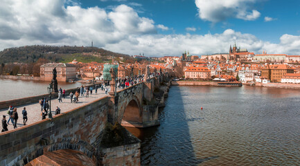Scenic spring panoramic aerial view of the Old Town pier architecture and Charles Bridge over...