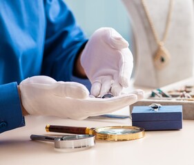 Young jeweler working in his workshop