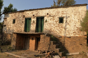 View of a dilapidated house after the exodus of villagers from Uttarakhand.