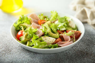Healthy avocado salad with ham