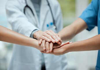 Stack, team building or hands of doctors with collaboration for healthcare goals in meeting or community. Closeup, teamwork or medical nurses with group support, motivation or mission in hospital