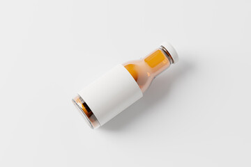 clear glass juice bottle