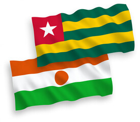 Flags of Togolese Republic and Republic of the Niger on a white background