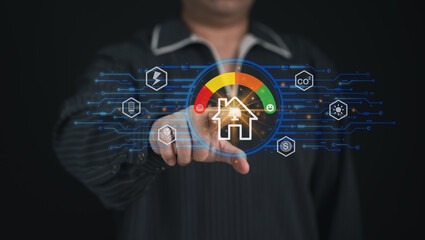 Concept smart home technology : businessman touching or pressing the virtual screen for Remotely control home appliances using the internet system and AI.	