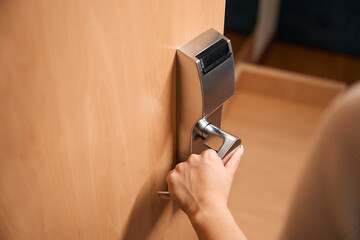Adult person enter inside of the room