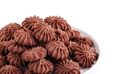 Stack of chocolate chip cookies on plate isolated