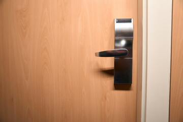 Closed door. Fragment of closeup view of modern door handles