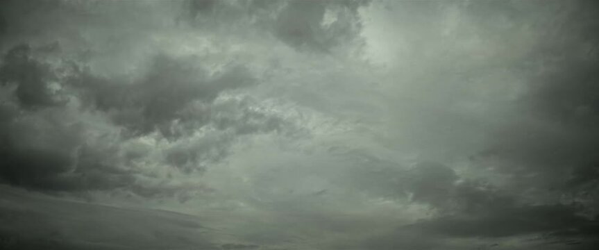 Timelapse of grey clouds anamorphic