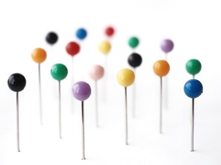 Ball head colorful sewing pins isolated on white